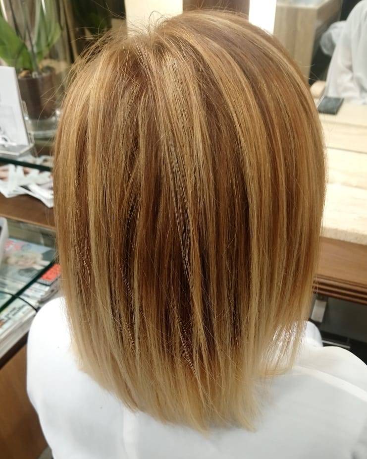 coupe mi-longue et balayage blond cuivré